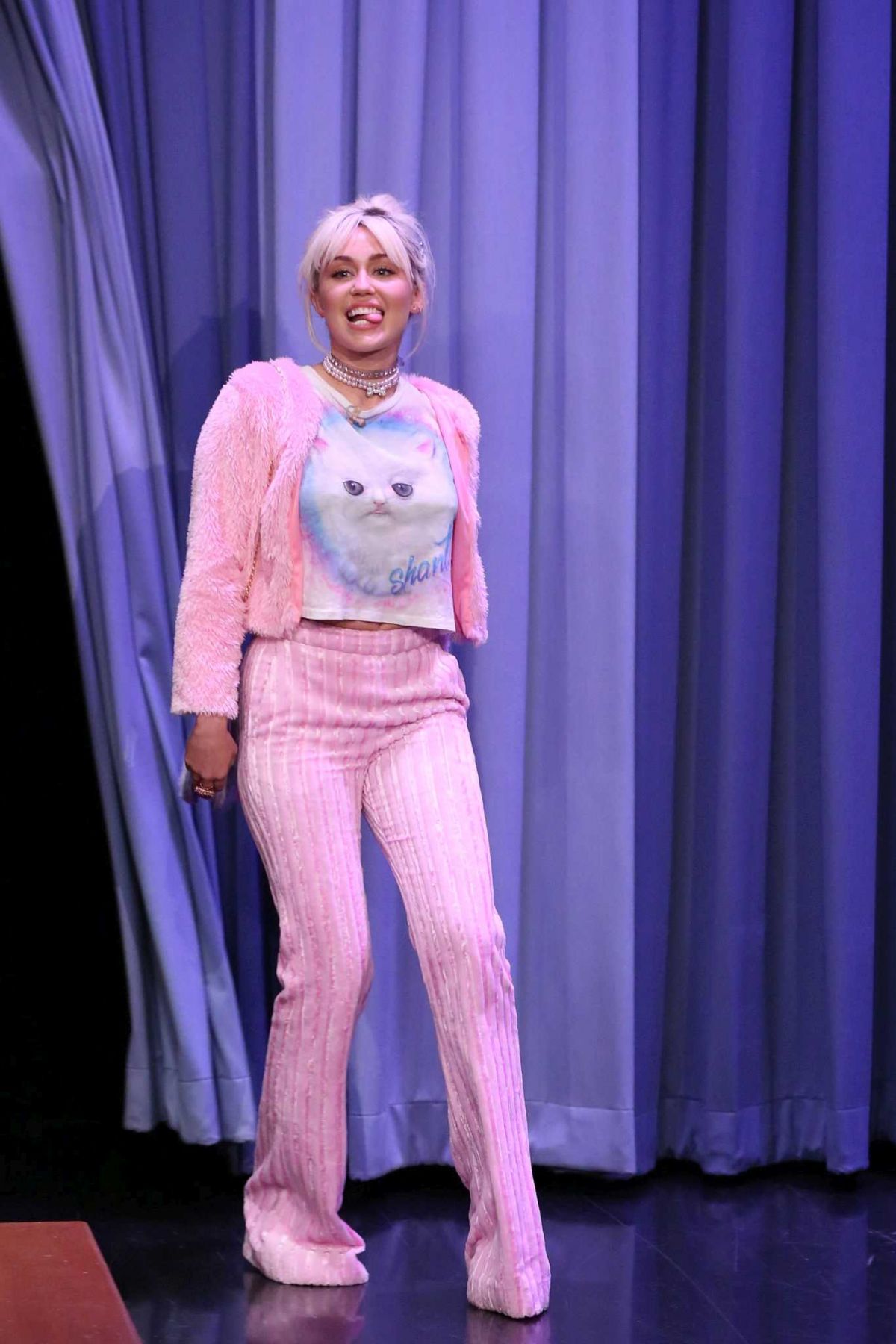 Miley Cyrus Wears Cat-Themed Ensemble On Stage